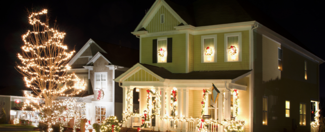 Festively decorated home with glowing holiday lights and wreaths, powered by Go Local Powur solar energy, showcasing energy-efficient outdoor illumination and sustainable holiday charm.